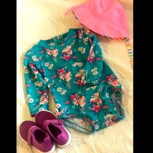 RuffleButts® Toddler Long Sleeve One Piece Swimsuit with UPF 50+ Sun Protection